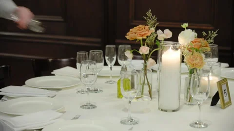 Waters serve table with glasses, plates and cutlery for the celebration party. Stock Footage 304297935