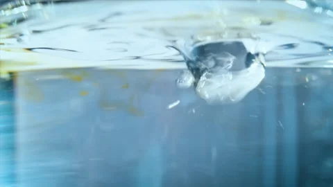 Waters surface moves because of air flow on top. Chemistry or drinks concept. Stock Footage 162048105
