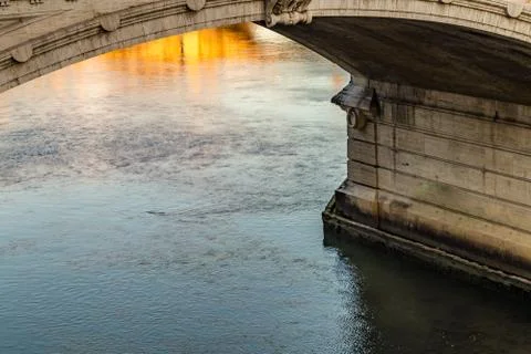 Waters under ancient bridge Stock Photos