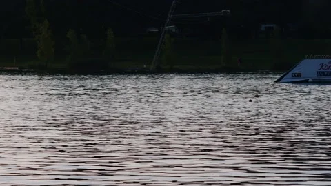 Waterski on lake ausee in austria Stock Footage 135816429