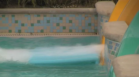 Waterslide Ending in Pool with a Splash Video stock 31921940
