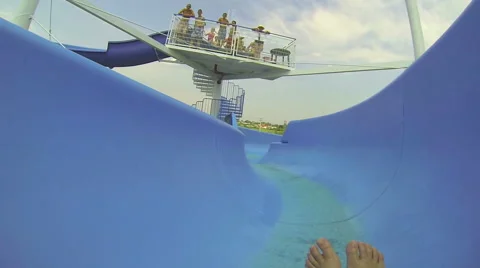 Watersliding - Splash into Swimming Pool Stock Footage 49290043