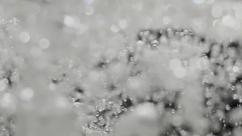Watersplash surface in slowmotion, bubbles under water Stock Footage 85795614