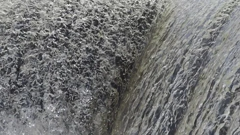 Waterwall on the river in sunshine Video stock 153284694