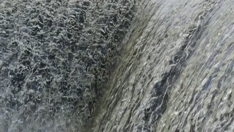 Waterwall on the river in sunshine Stockbeeldmateriaal 153284856