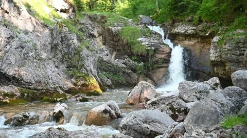A waterwall of a rocky mountain stream Stock Footage 219351333
