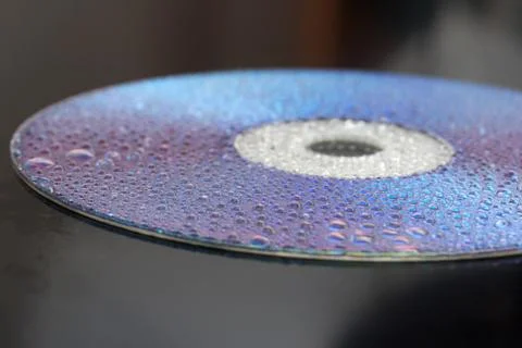 Watter drops on cd Stock Photos