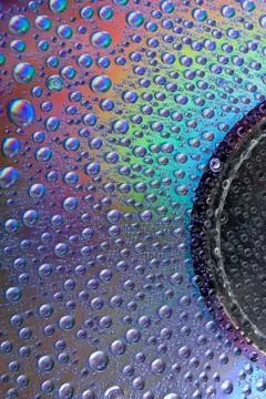 Watter drops on cd Stock Photos