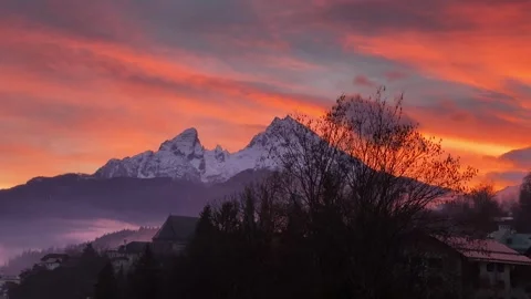 Watzmann mountain against the background of an orange sky, sunset Stock Footage 323211512