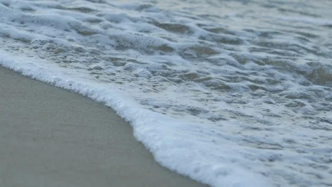 Wave is Absorbed into the Sand Stock Footage 89736209