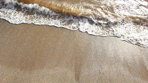 Wave Action Over Sandy Beach Stock Footage 95725497