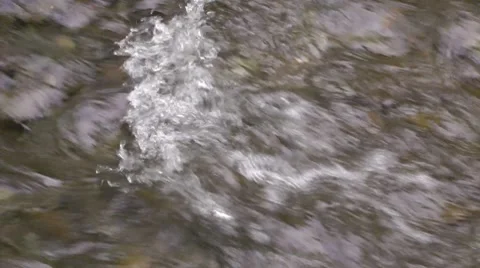 Wave against the current - result of a barrier from stones Video stock 8555850