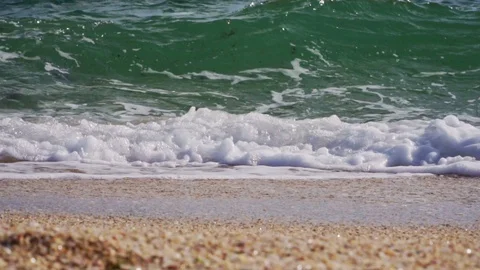 Wave with algae in slow motion closeup Stock Footage 102311979
