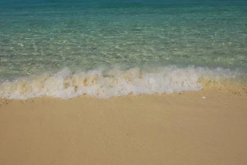 Wave and beach Stock Photos