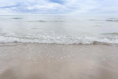 Wave and beach Stock Photos