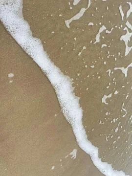 Wave and beach Stock Photos