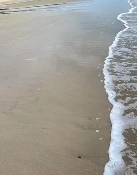 Wave and beach Stock Photos