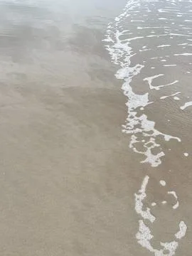 Wave and beach Stock Photos