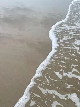 Wave and beach Stock Photos