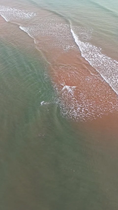 Wave and beach in slow motion Stock Footage 322961838