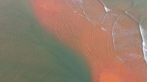 Wave and beach in slow motion Stock Footage 322961864