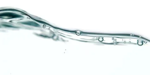 Wave and bubbles Stock Photos