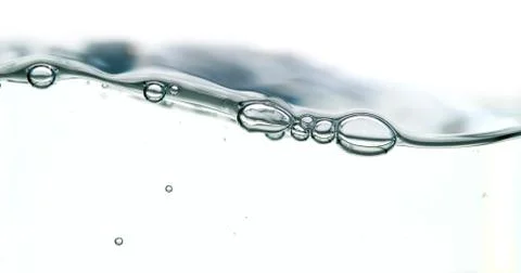 Wave and bubbles Stock Photos