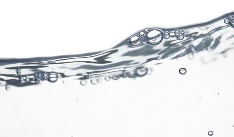 Wave and bubbles Stock Photos