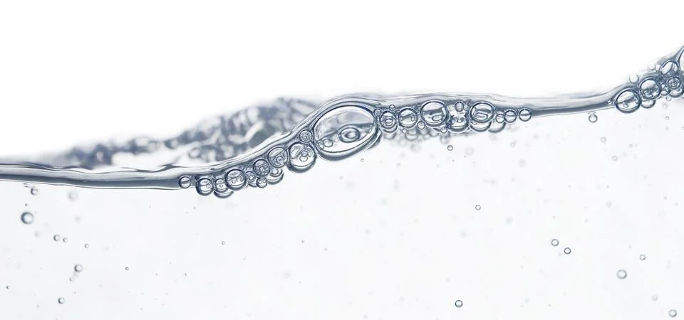 Wave and bubbles Stock Photos
