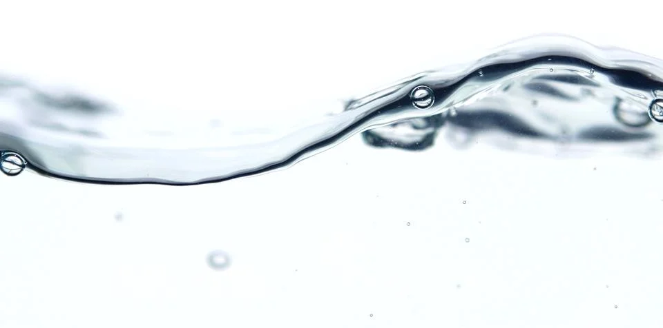 Wave and bubbles Stock Photos