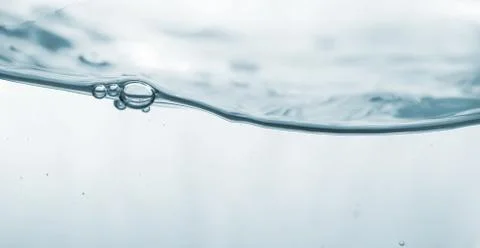 Wave and bubbles Stock Photos