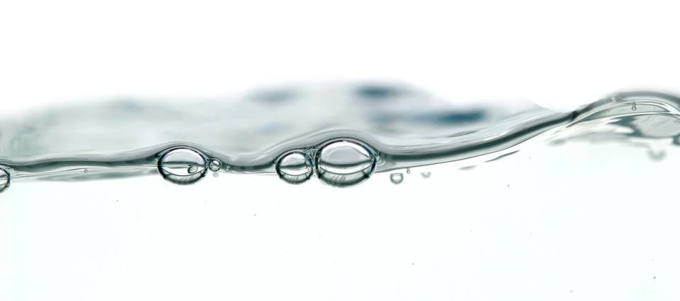 Wave and bubbles Stock Photos