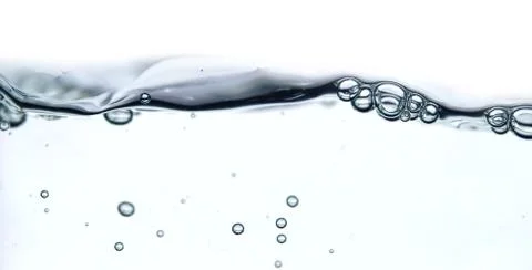 Wave and bubbles Stock Photos