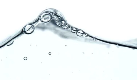 Wave and bubbles Stock Photos