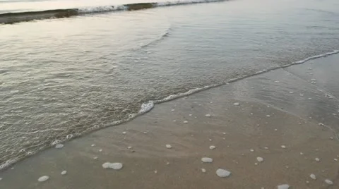 Wave and reflection on the beach Stock Footage 50375913