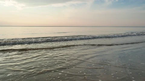 Wave and reflection on the beach Stock Footage 50376451