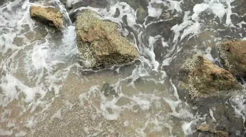 Wave and rock Stock Footage 12733459