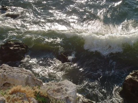 Wave and rock Stock Photos