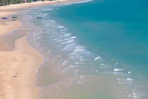 Wave and sand beach for background. Stock Photos
