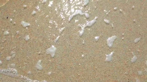 Wave and sand beach Stock Footage 10809898