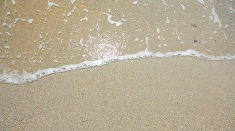 Wave and sand beach Stock Footage 10809917