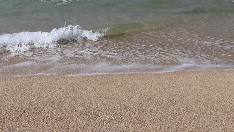 Wave and sand beach Stock Footage 230059486
