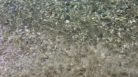 Wave and sea beach. Pebbles and sea beach. Stock Footage 76211896