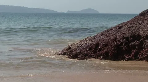 Wave and stone Stock Footage 22070648