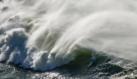 The wave and the surfer Foto stock