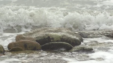 Wave approaching the rocks. Slow motion. Stock Footage 52941436