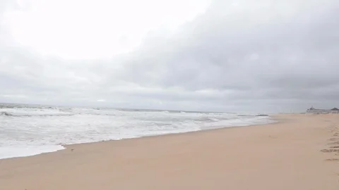 Wave on beach coast view overcast sky Video stock 91333639