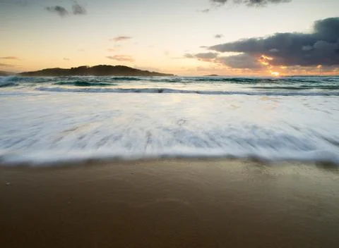 Wave on the beach Stock Photos