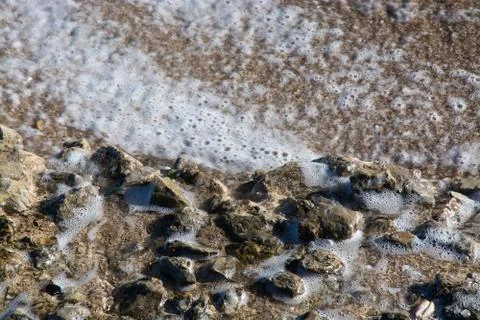 Wave on beach Stock Photos