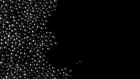 Wave of black shine balls from left side on black background. Glossy spheres Illustrazione stock
